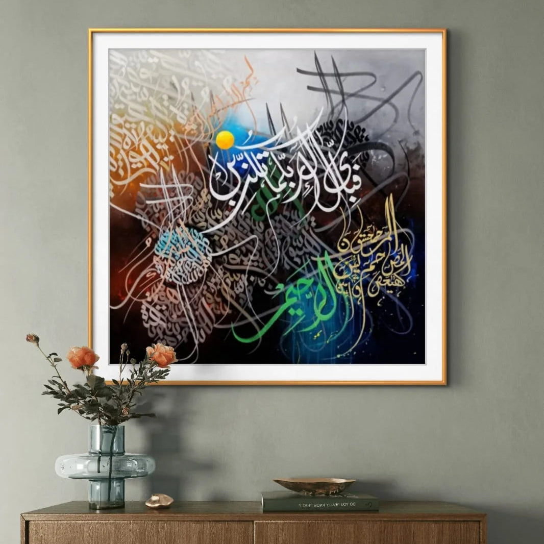 Framed artwork with colorful calligraphy on a gray wall above a wooden cabinet.